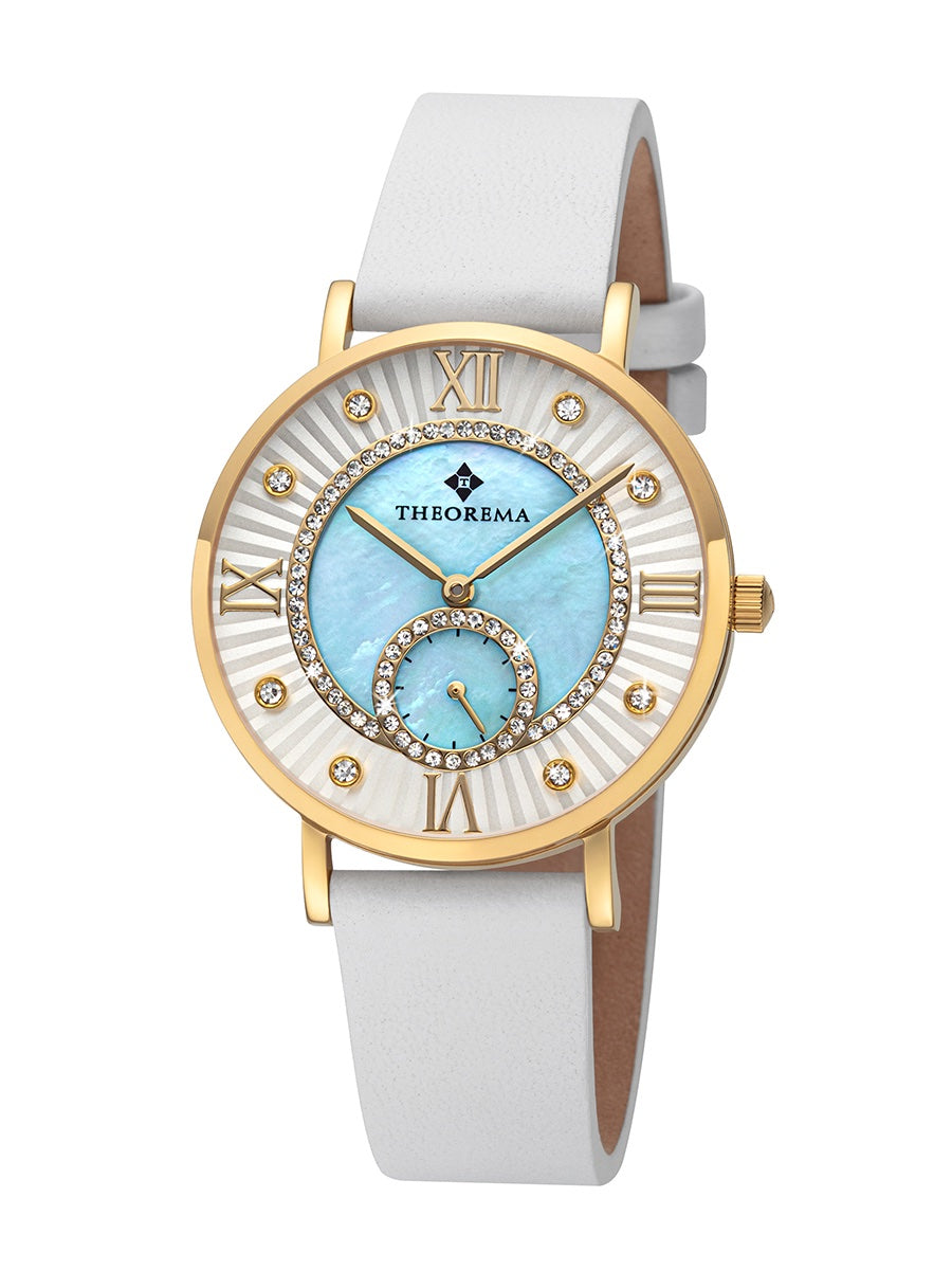 Luxury women’s timepiece with gold accents, crystal rings, and a soft blue dial by Theorema.