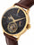 Open heart design at 6 o'clock to see the tourbillon movement with stick numbers and dauphine-shaped hands. 