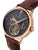 Open heart design at 6 o'clock to see the tourbillon movement with stick numbers and dauphine-shaped hands. 