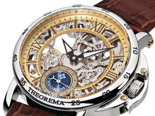 Dial with Roman numerals and silver case with Arabic numerals.