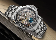 Black and white hands. Silver case with Arabic numerals on top. Stainless steel band.